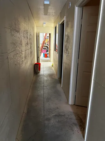 a bathroom with a sink a mirror and shower