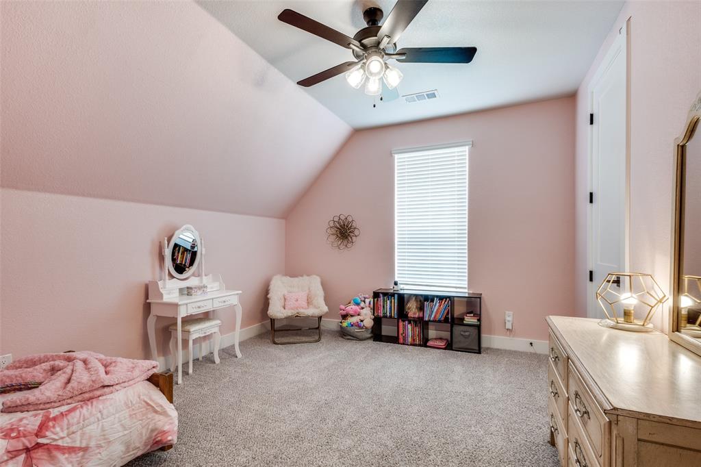 2255 County Road 377 Van Alstyne, TX 75495 - Photo 21 of 35 a living room with furniture and a chandelier