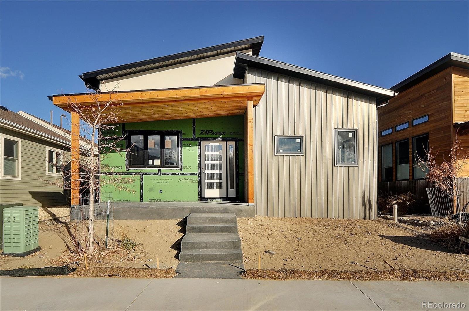 322 Two Rivers Road Salida, CO 81201 - Photo 1 of 18 a front view of a house with a porch
