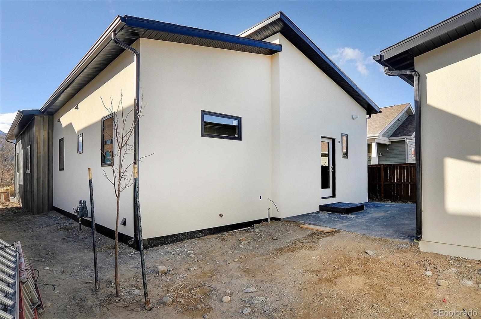 322 Two Rivers Road Salida, CO 81201 - Photo 15 of 18 a view of a house with a backyard
