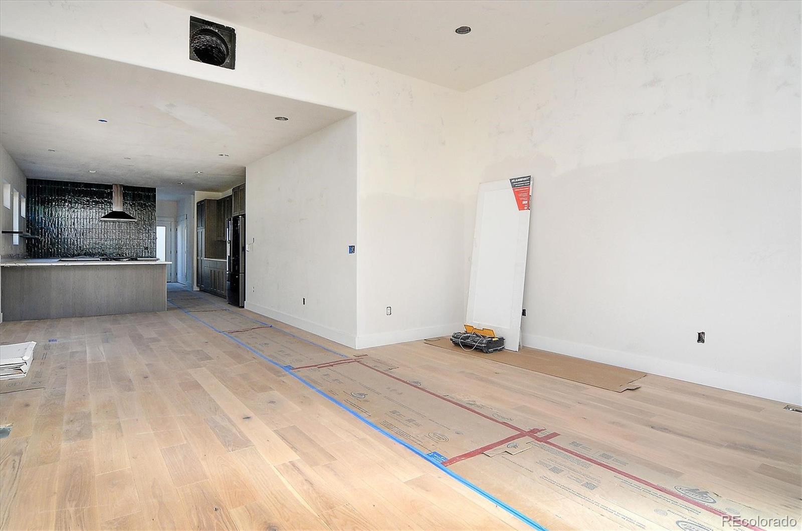 322 Two Rivers Road Salida, CO 81201 - Photo 2 of 18 a view of empty room with wooden floor