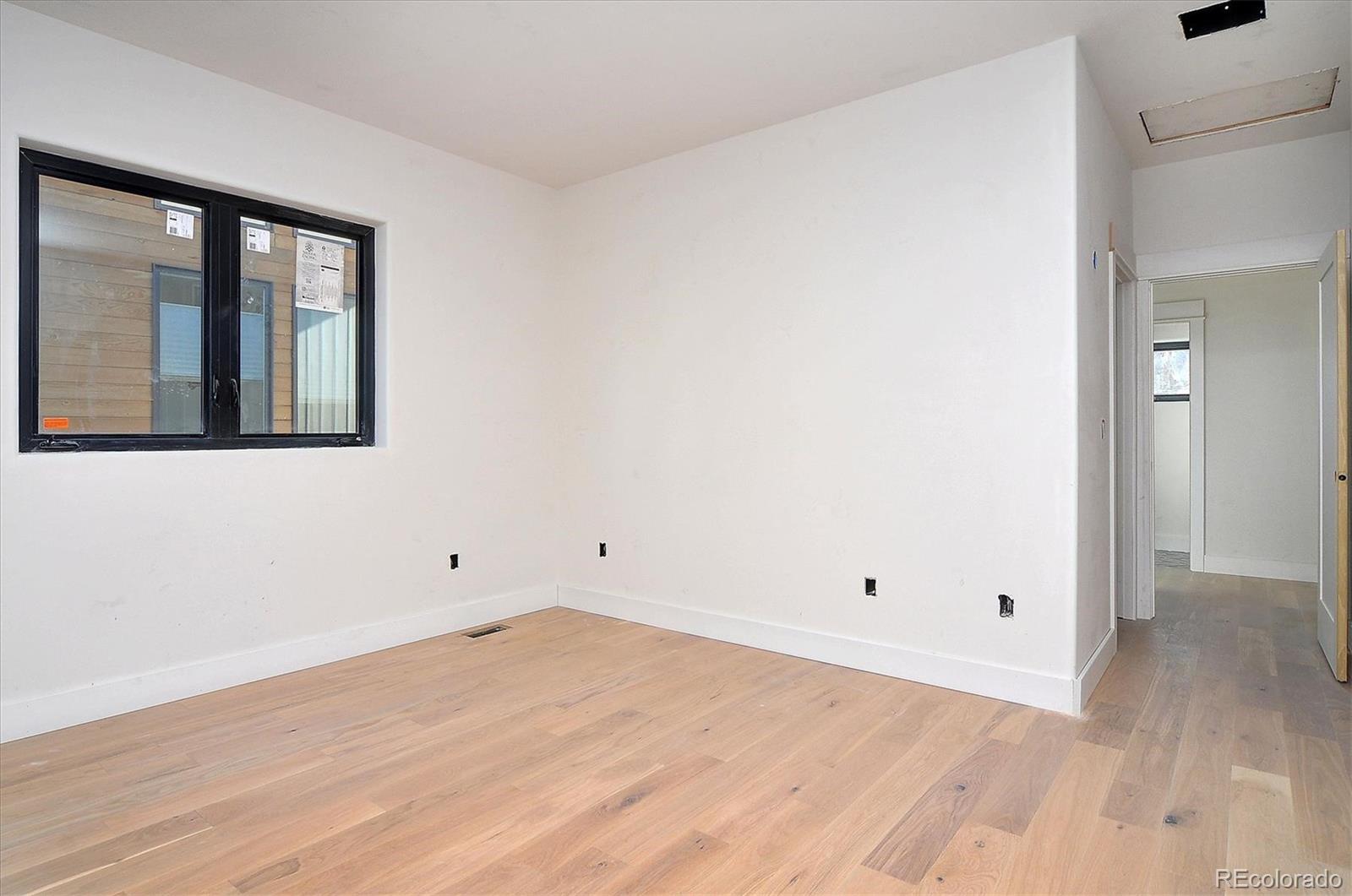 322 Two Rivers Road Salida, CO 81201 - Photo 8 of 18 wooden floor and white walls