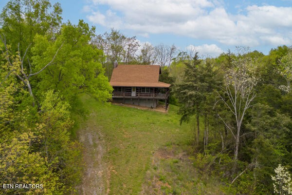 1428 Goodwater Road Bybee, TN 37713 - Photo 21 of 43 a view of a house with a yard