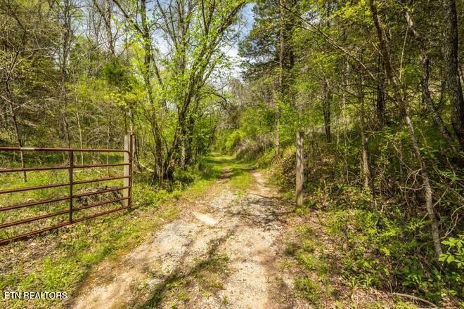 1428 Goodwater Road Bybee, TN 37713 - Photo 26 of 43 a view of empty room with wooden fence