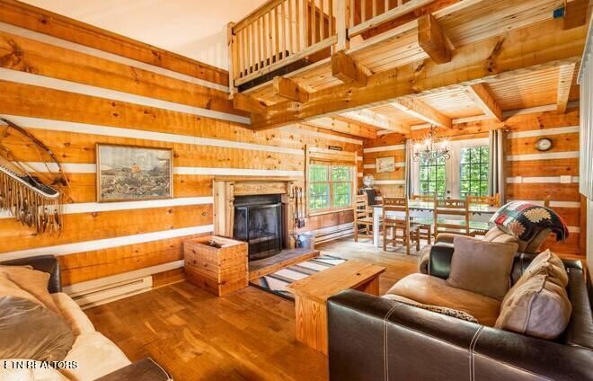 1428 Goodwater Road Bybee, TN 37713 - Photo 4 of 43 a outdoor living space with patio furniture and a fireplace