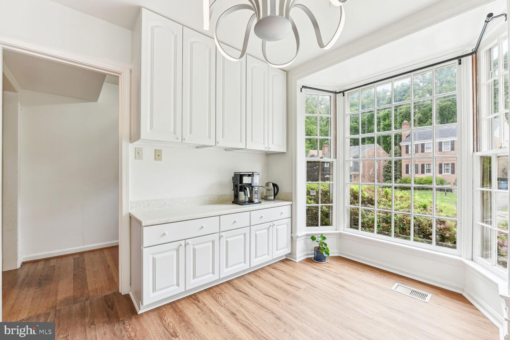6719 Baron Road McLean, VA 22101 - Photo 12 of 30 a view of a kitchen with an empty space and a window