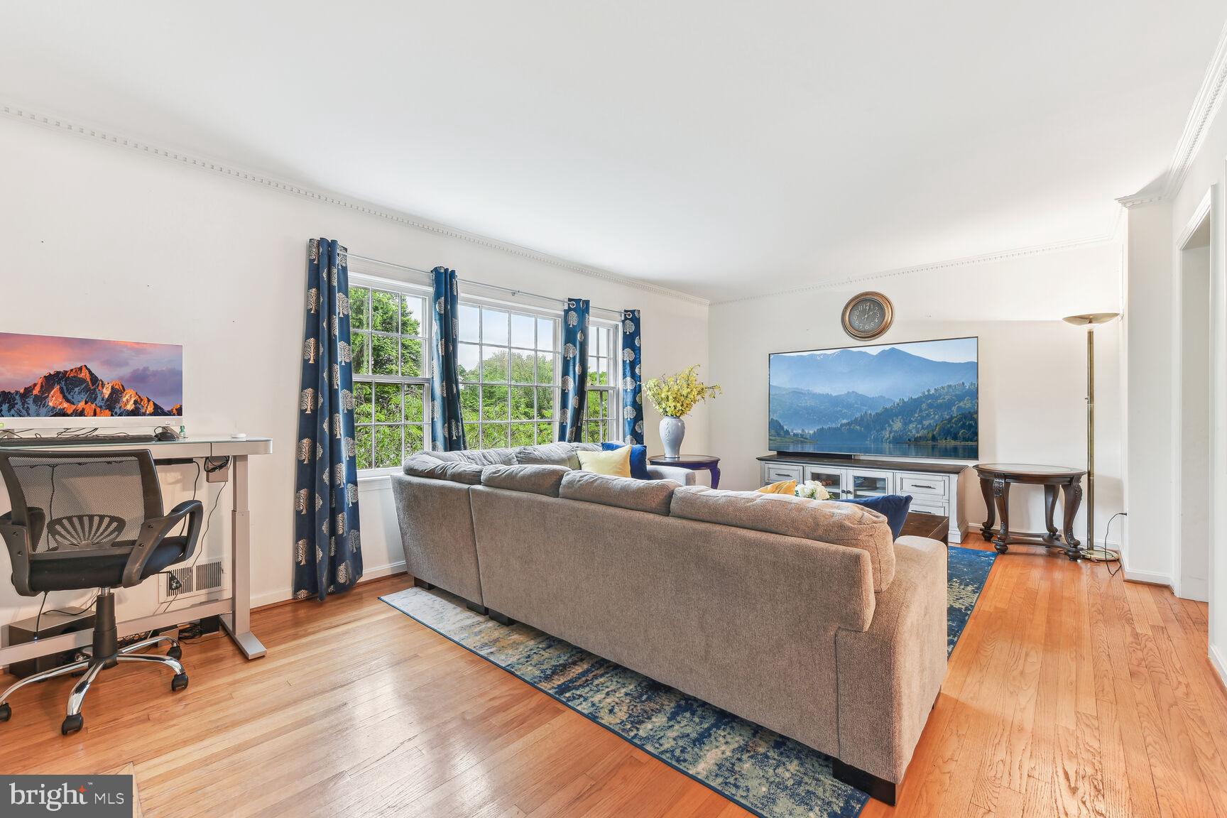 6719 Baron Road McLean, VA 22101 - Photo 6 of 30 a living room with furniture and a flat screen tv