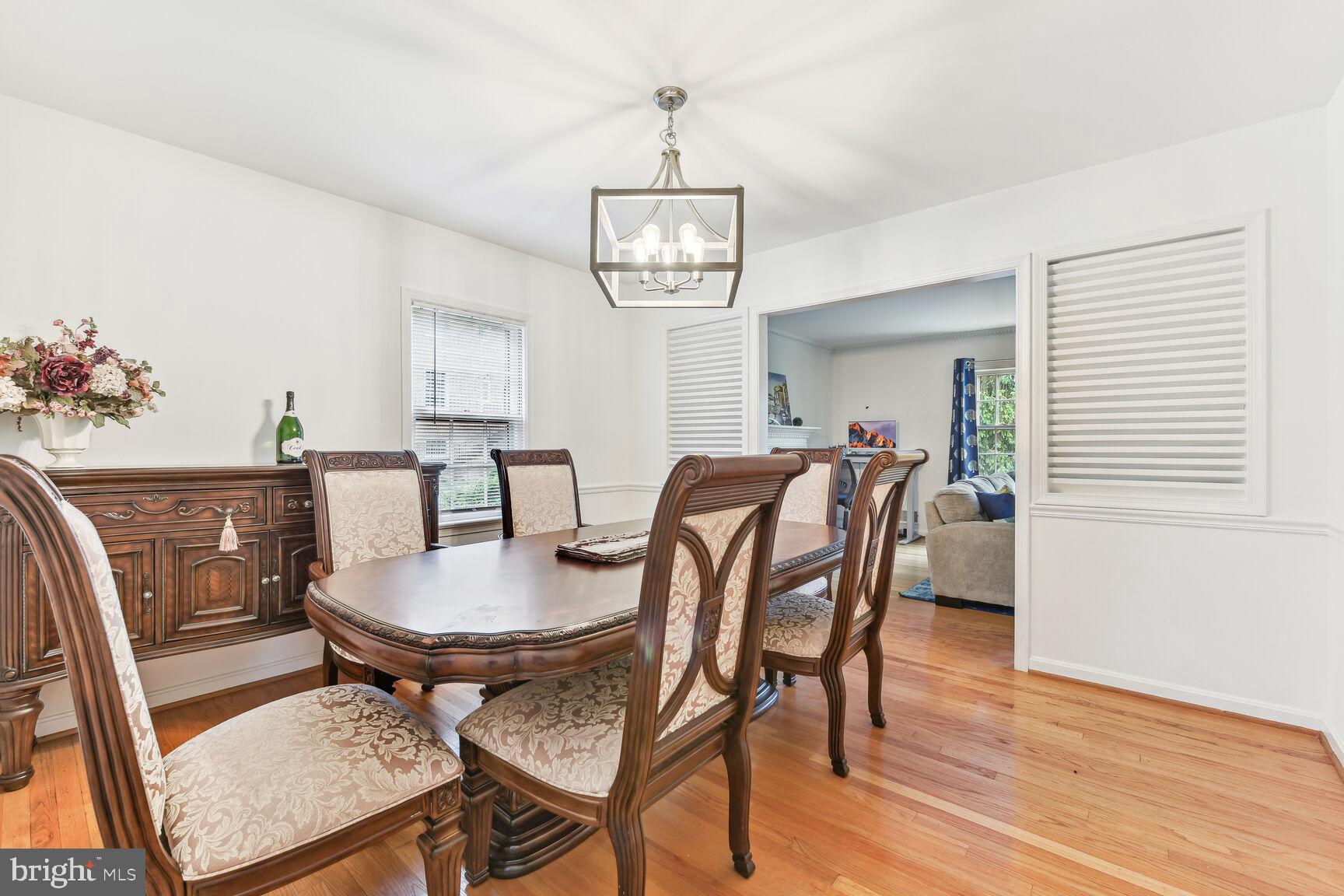 6719 Baron Road McLean, VA 22101 - Photo 9 of 30 a view of a dining room with furniture window and wooden floor
