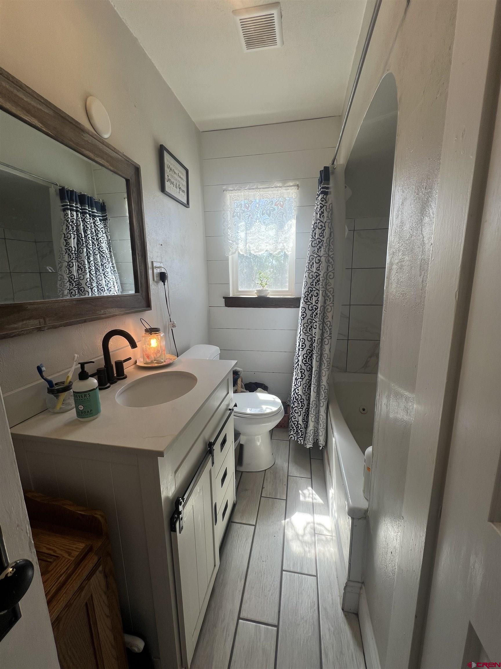 20691 Fairview Road Austin, CO 81410 - Photo 13 of 42 a bathroom with a sink and a mirror