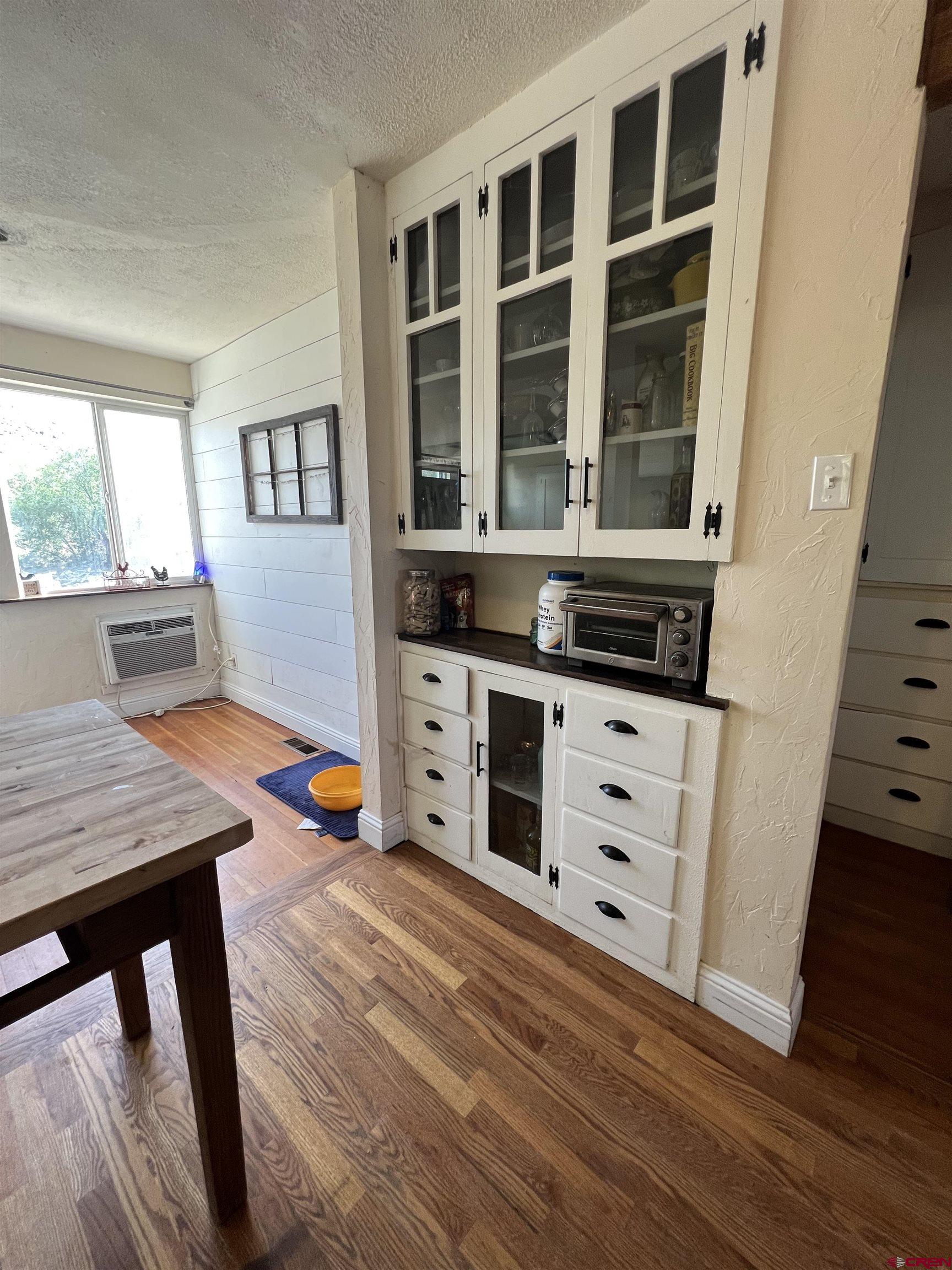 20691 Fairview Road Austin, CO 81410 - Photo 17 of 42 a view of a workspace with furniture and a window