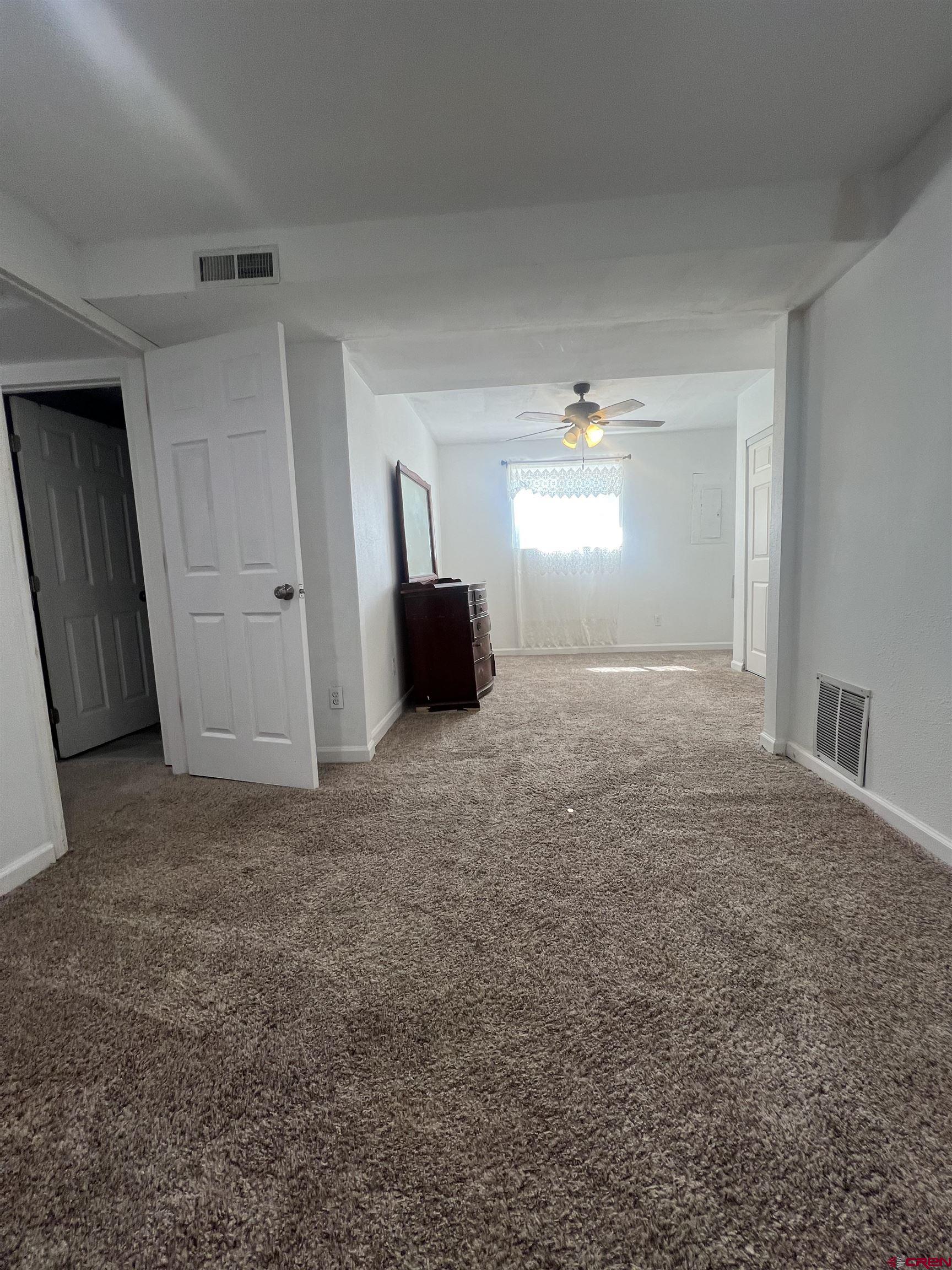 20691 Fairview Road Austin, CO 81410 - Photo 22 of 42 a view of an empty room and window