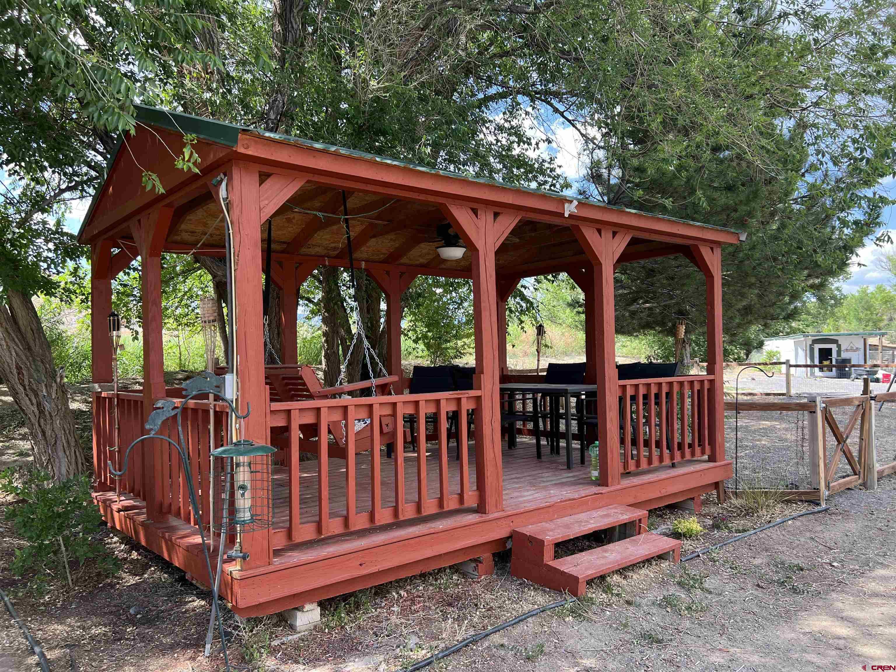 20691 Fairview Road Austin, CO 81410 - Photo 26 of 42 a view of a wooden deck with a yard