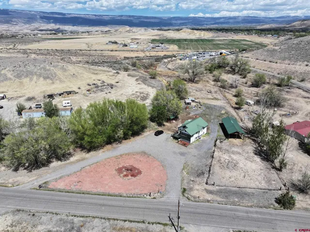 a view of a backyard of a house