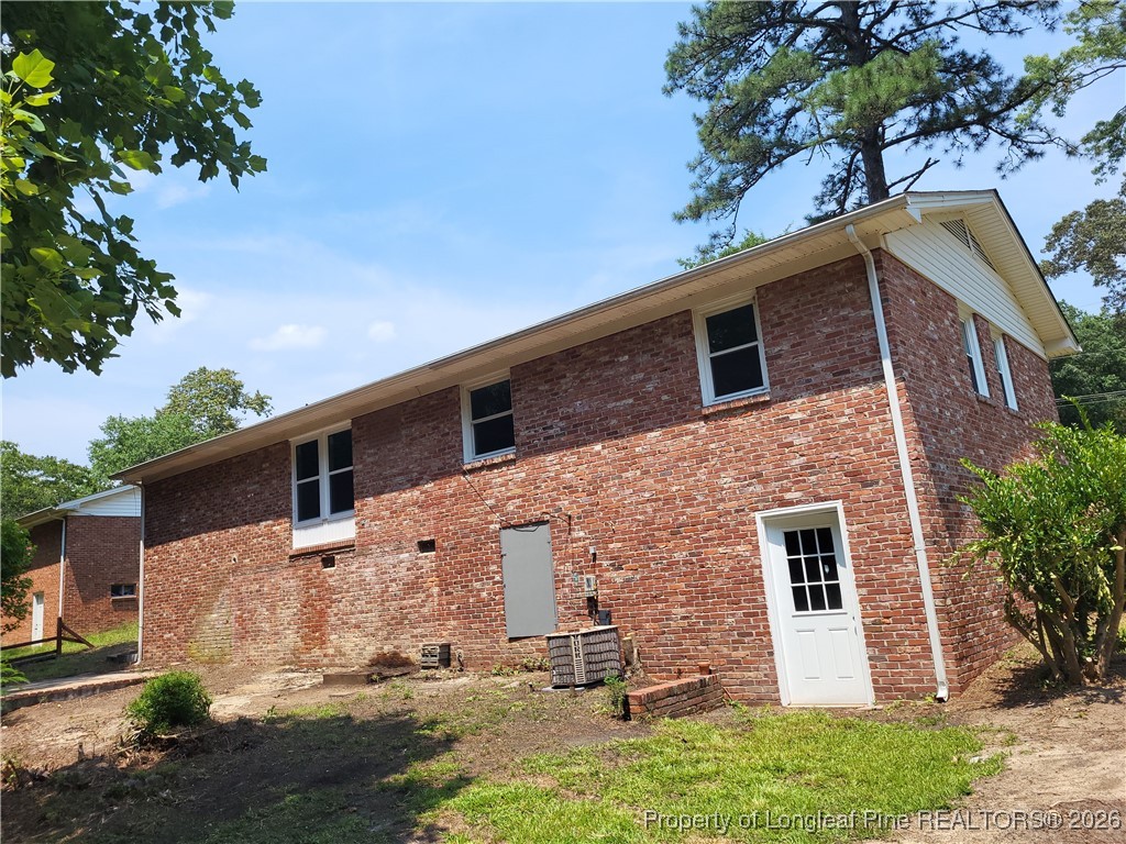 182 Summerhill Road Fayetteville, NC 28303 - Photo 3 of 24 front view of house with a yard