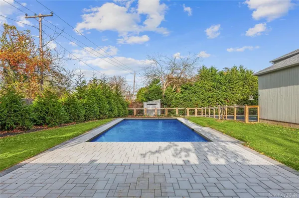a view of outdoor space yard and swimming pool