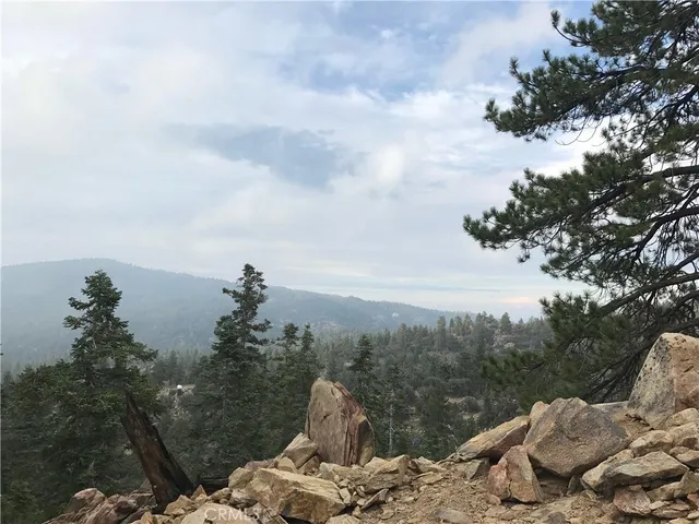 a view of snow on the road