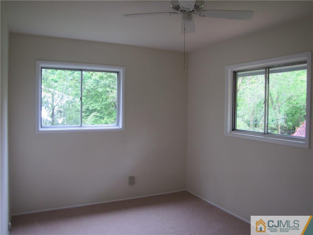 32 Raleigh Road Kendall Park, NJ 08824 - Photo 14 of 18 an empty room with a window