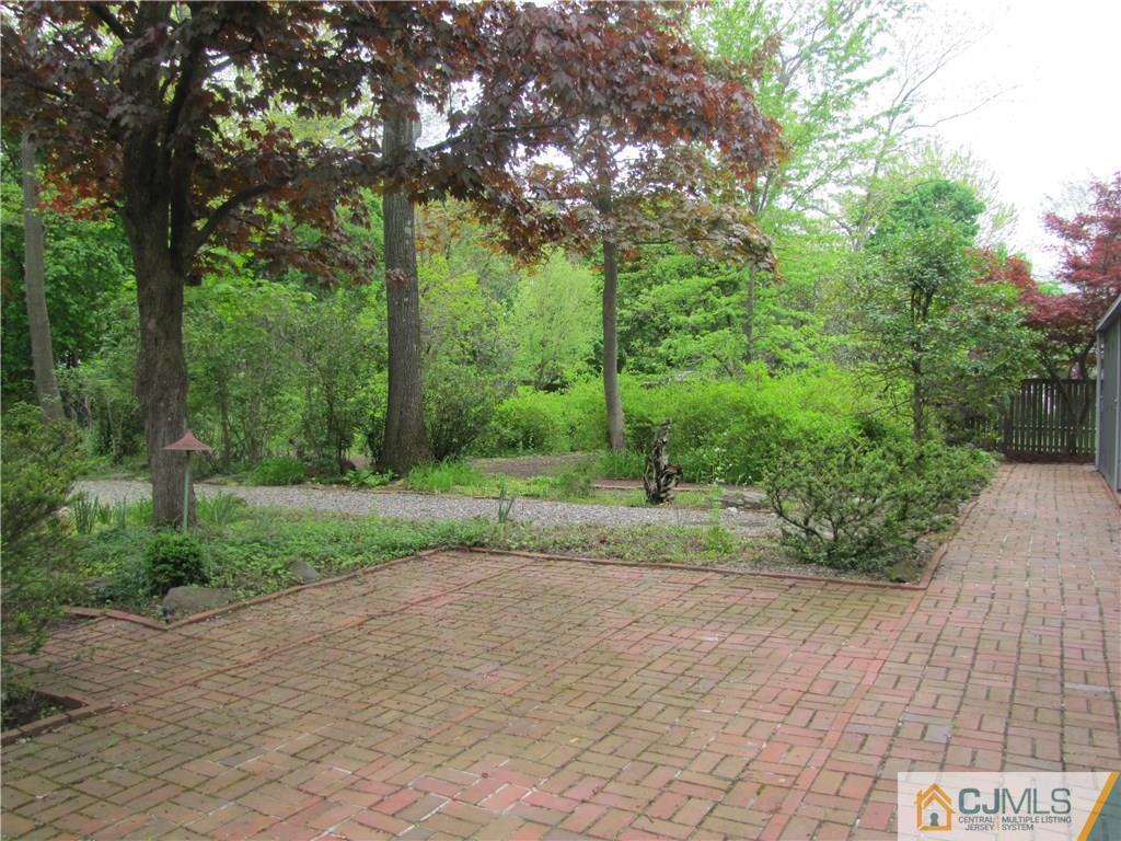 32 Raleigh Road Kendall Park, NJ 08824 - Photo 15 of 18 a view of a street with a trees