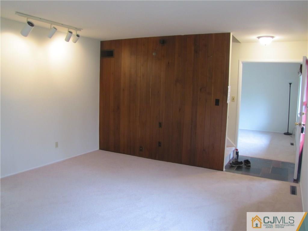 32 Raleigh Road Kendall Park, NJ 08824 - Photo 5 of 18 a view of an empty room