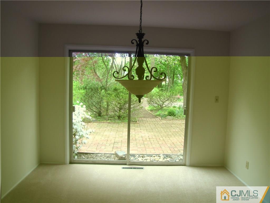 32 Raleigh Road Kendall Park, NJ 08824 - Photo 6 of 18 a view of a room with a large window