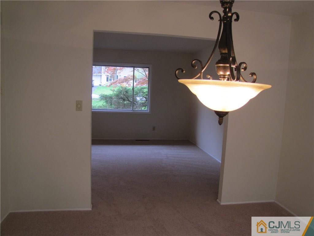 32 Raleigh Road Kendall Park, NJ 08824 - Photo 7 of 18 a view of a room with a sink