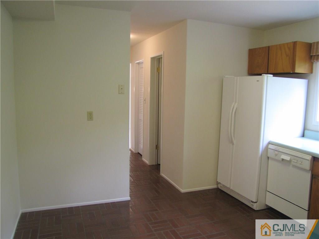 32 Raleigh Road Kendall Park, NJ 08824 - Photo 9 of 18 a view of walk in closet with window