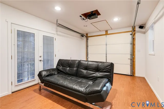 a bathroom with a toilet and a shower curtain
