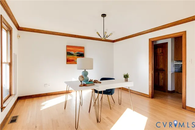 a workspace with furniture and window