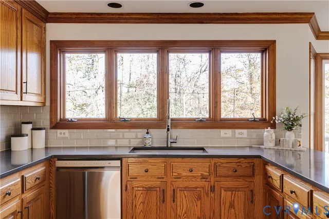 an empty refrigerator with wooden floor