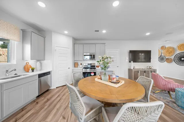 a view of a dining room with furniture