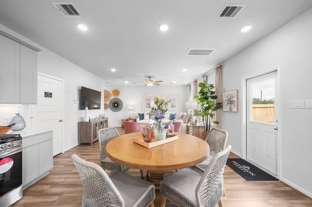 a view of a dining room with furniture