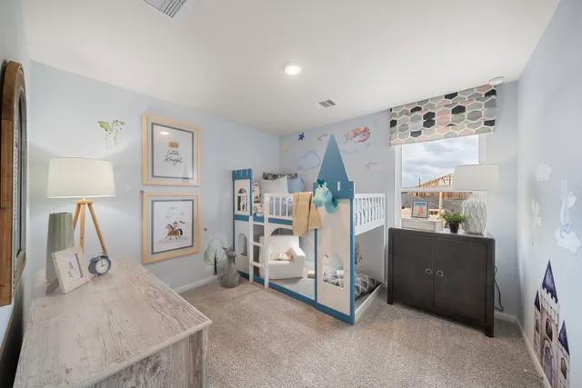 a view of livingroom with furniture and cabinet