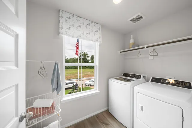 a utility room with dryer and washer