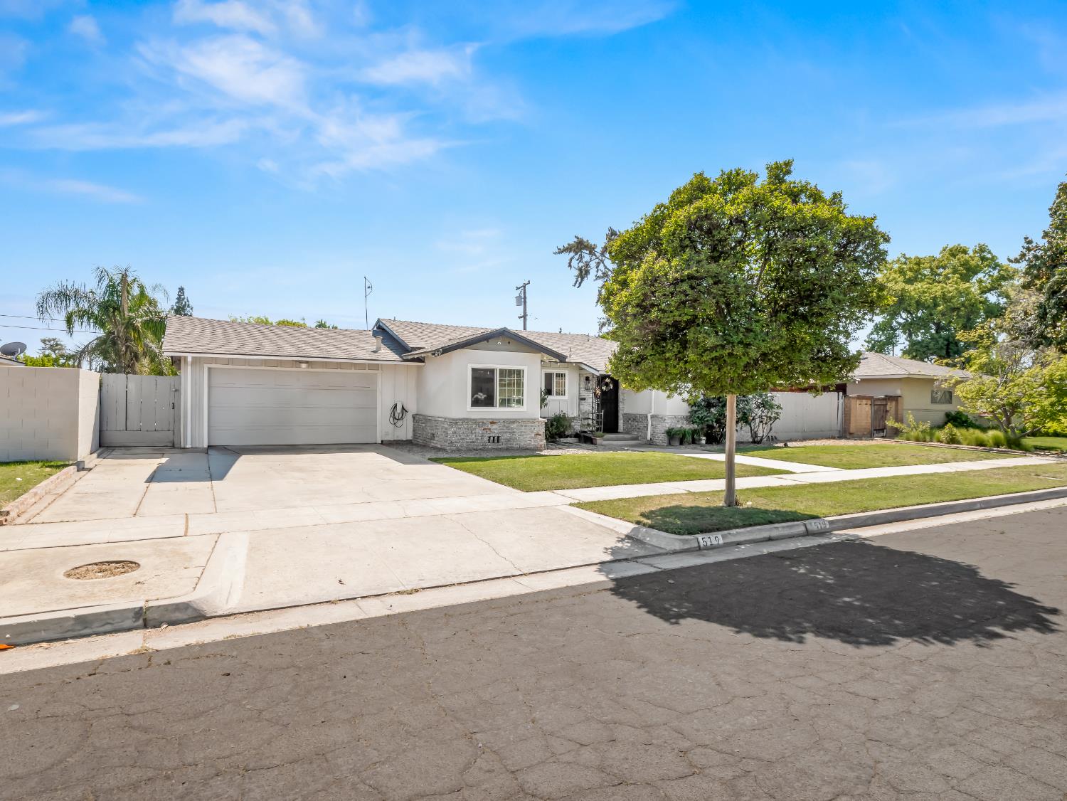 a house with yard in front of it