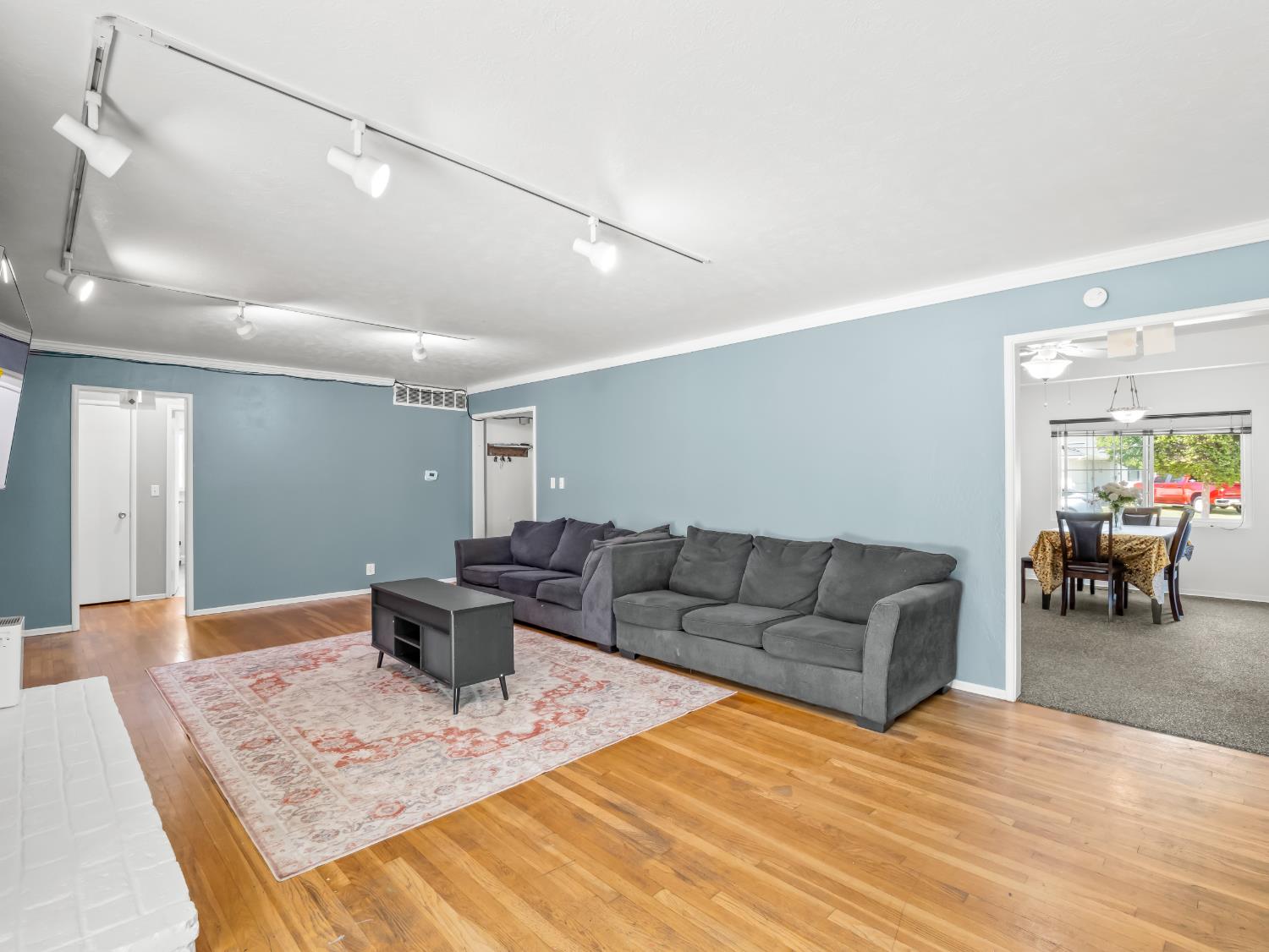 519 West Rialto Avenue Fresno, CA 93705 - Photo 12 of 36 a living room with furniture and view of kitchen