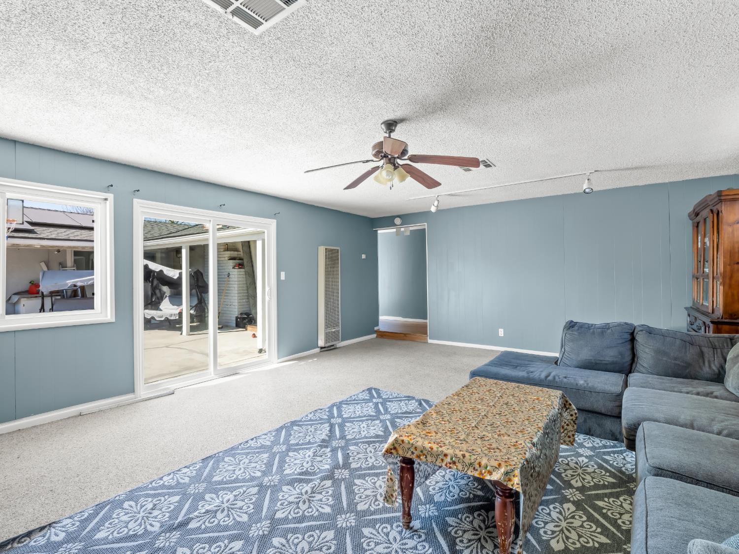 519 West Rialto Avenue Fresno, CA 93705 - Photo 17 of 36 a living room with furniture and a window