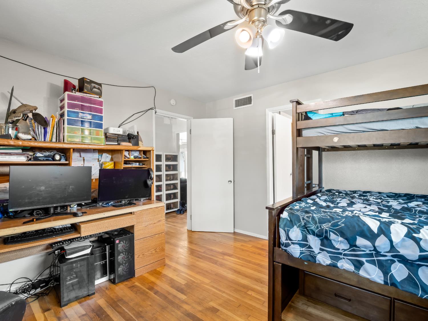 519 West Rialto Avenue Fresno, CA 93705 - Photo 18 of 36 a bedroom with furniture and a flat screen tv