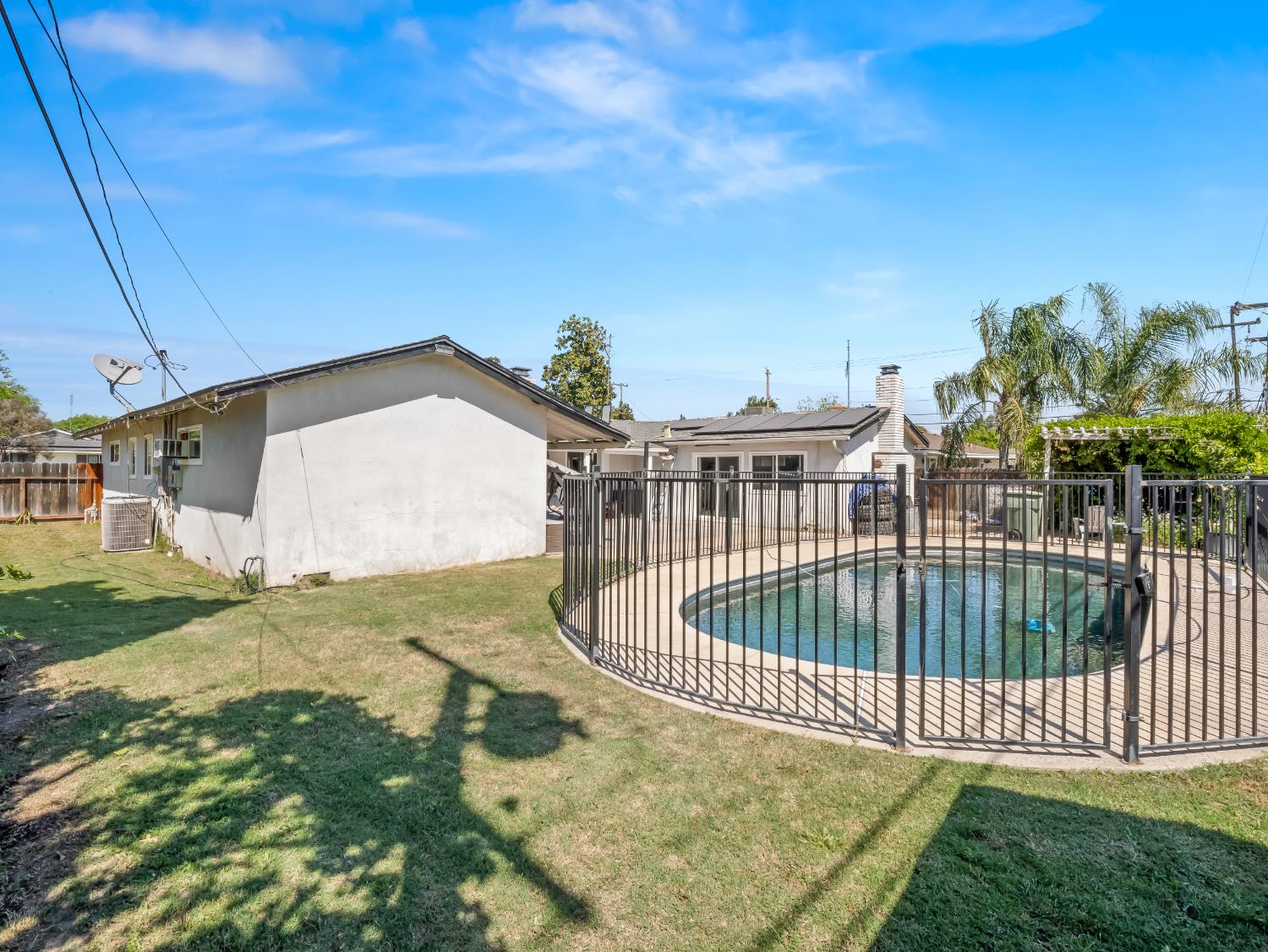 519 West Rialto Avenue Fresno, CA 93705 - Photo 29 of 36 a view of a wrought iron fences in front of house