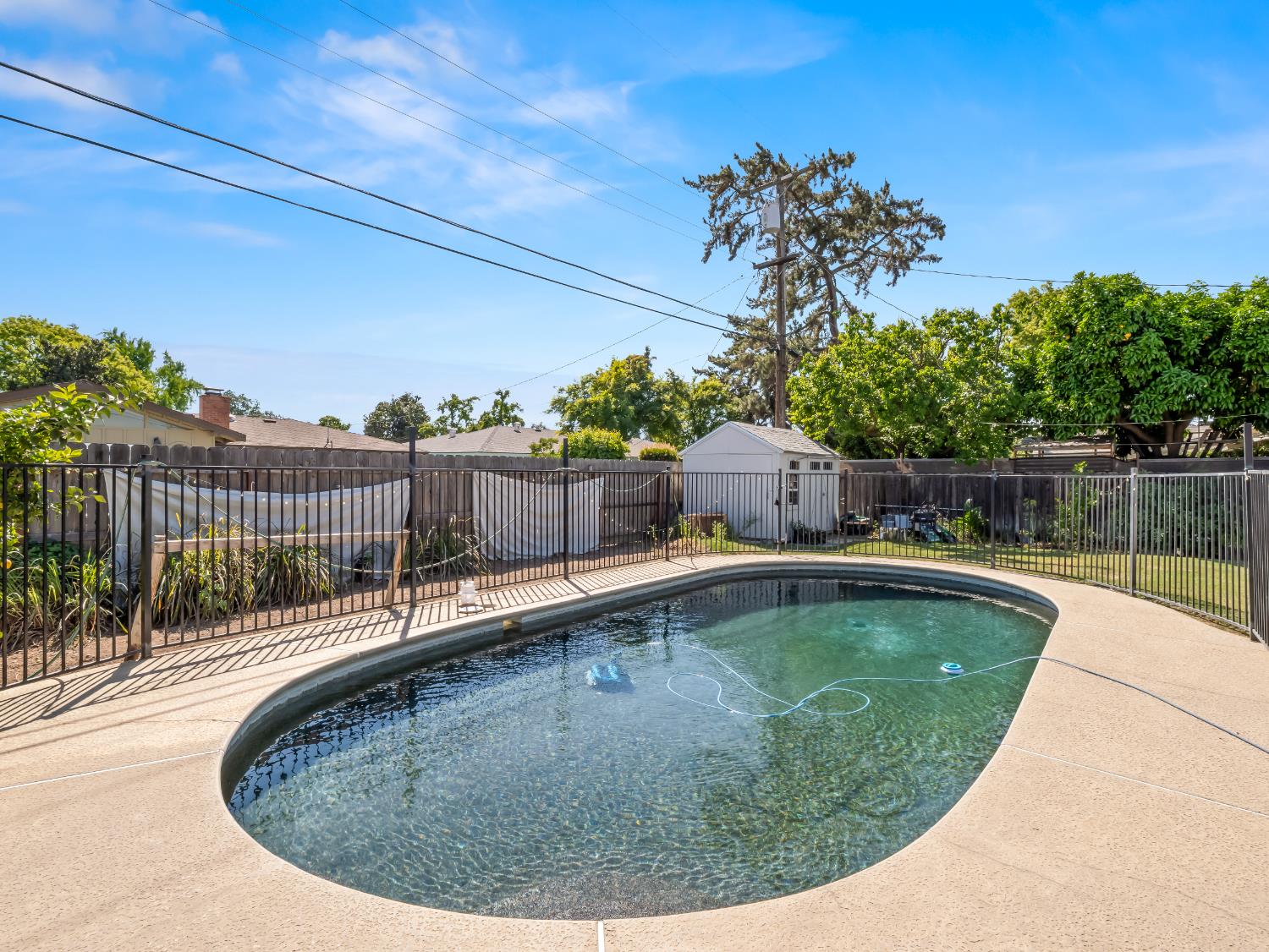 519 West Rialto Avenue Fresno, CA 93705 - Photo 36 of 36 a view of a swimming pool with a outdoor seating