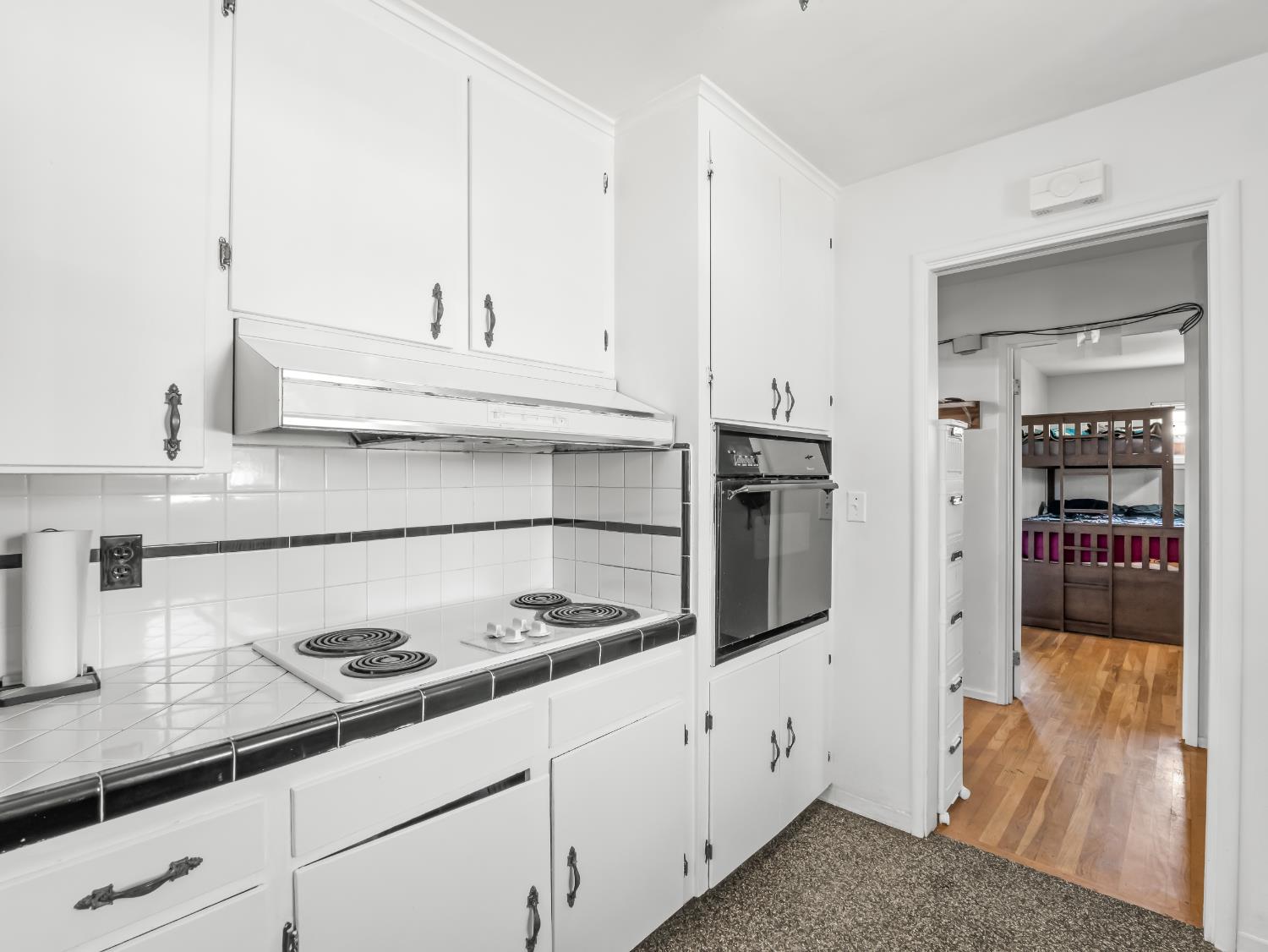 519 West Rialto Avenue Fresno, CA 93705 - Photo 5 of 36 a kitchen with granite countertop a sink stainless steel appliances and cabinets