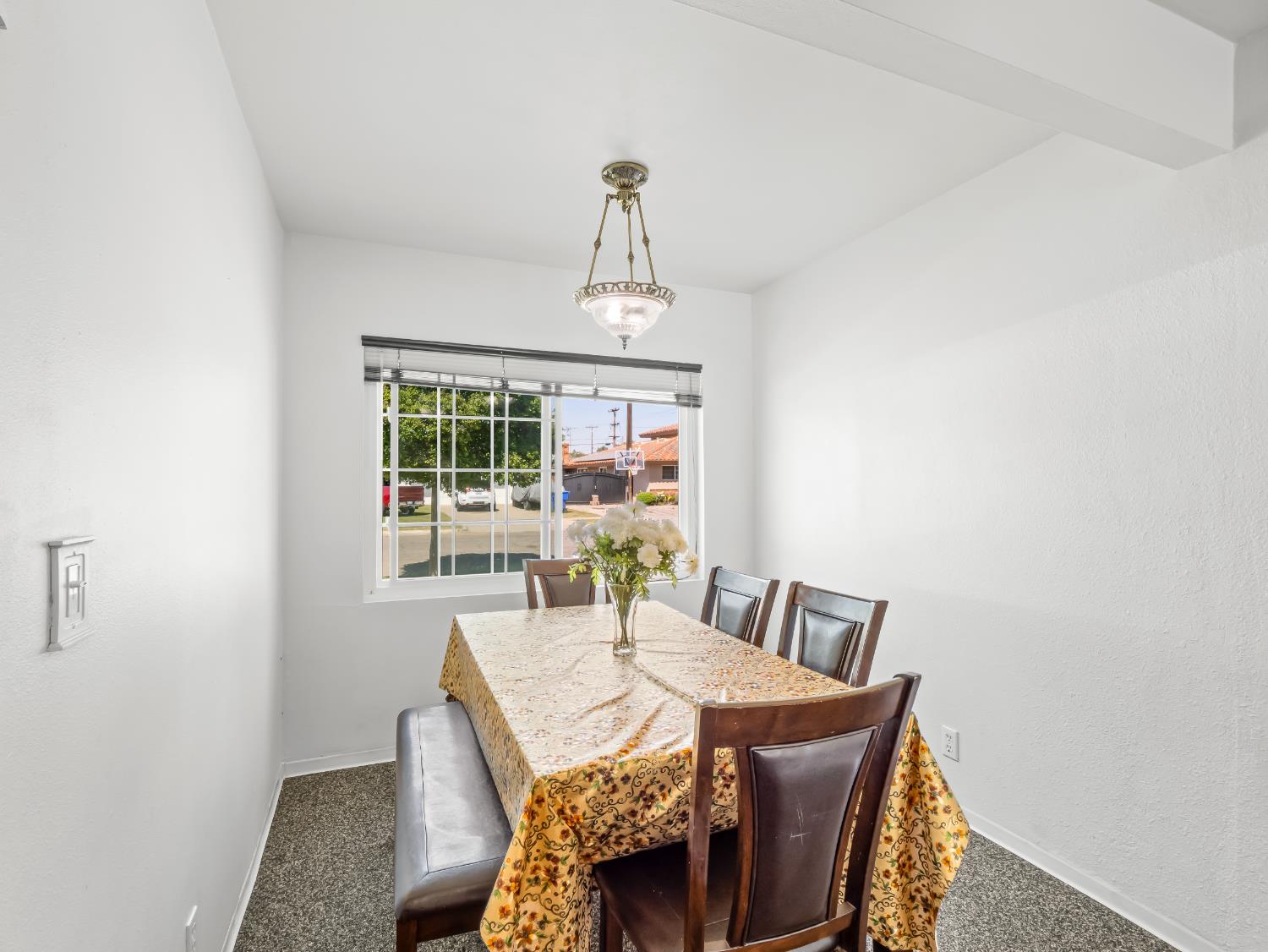 519 West Rialto Avenue Fresno, CA 93705 - Photo 9 of 36 a view of a dining room with furniture window and outside view