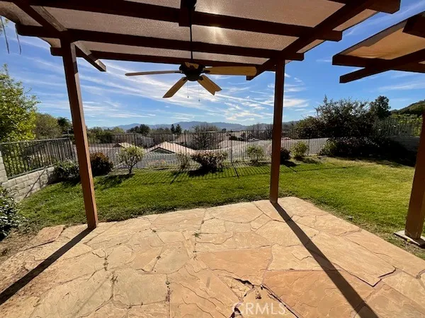 a view of a porch with a backyard