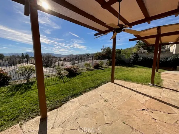 a view of a porch with a yard