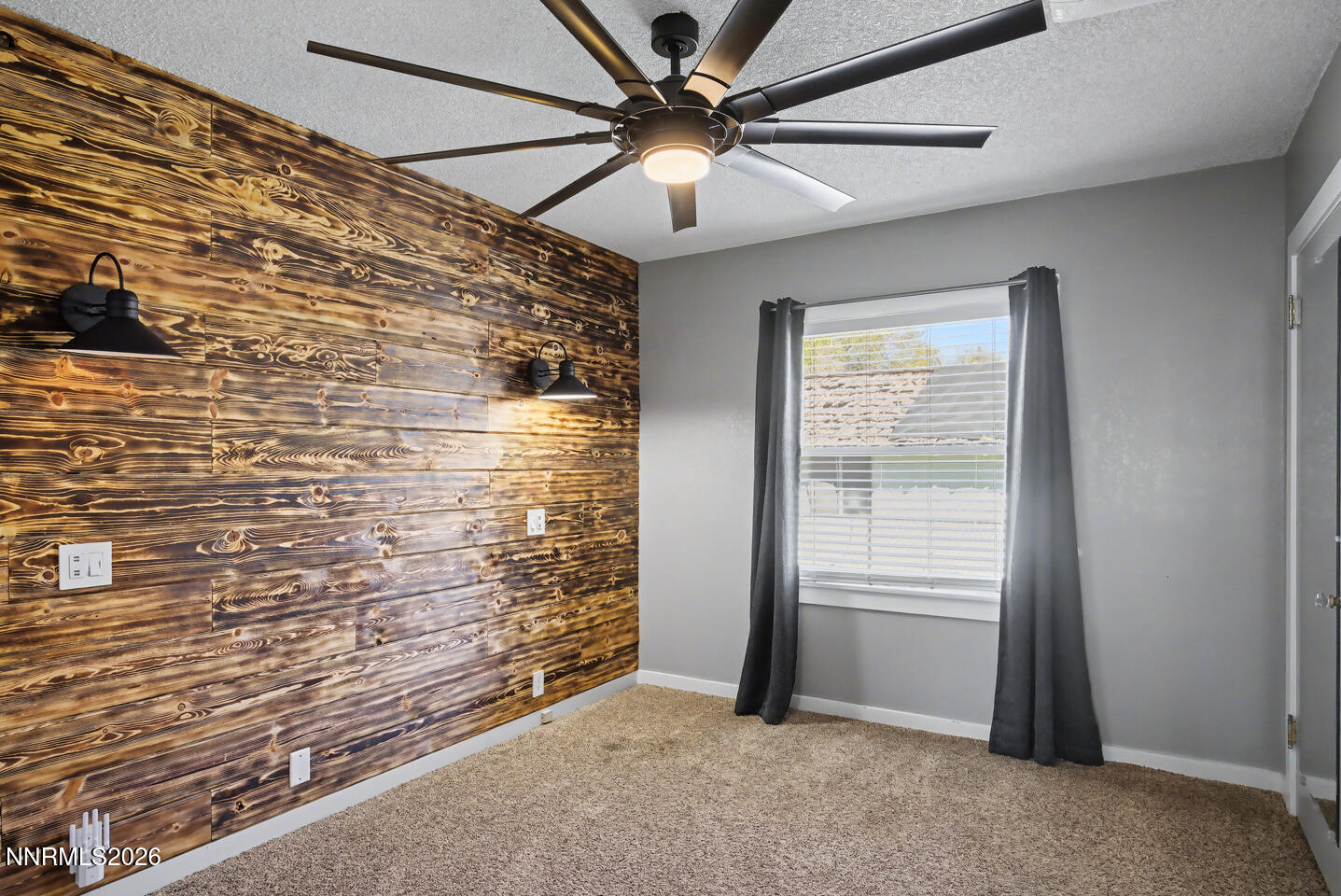 65 South Bailey Street Fallon, NV 89406 - Photo 11 of 34 a view of livingroom with an empty space