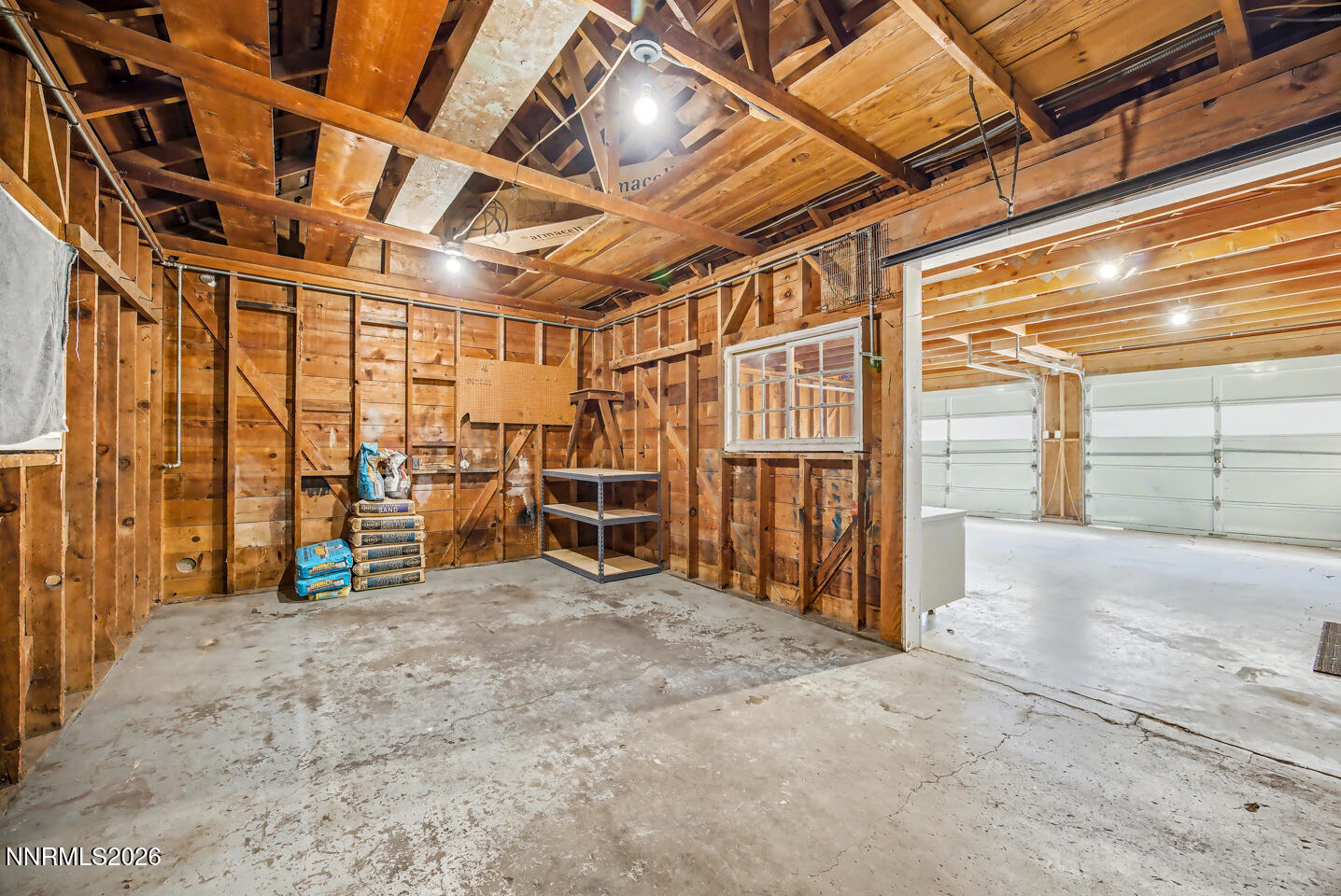 65 South Bailey Street Fallon, NV 89406 - Photo 23 of 34 a view of an empty room with wooden walls