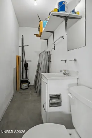 a view of a house with wooden fence