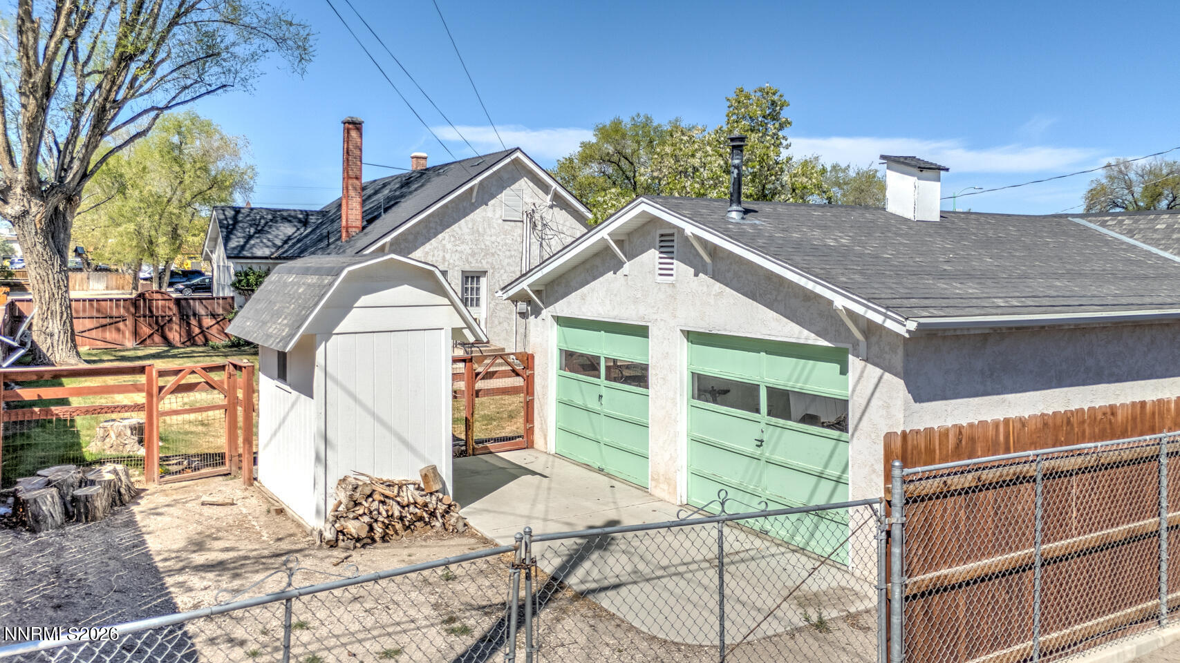 65 South Bailey Street Fallon, NV 89406 - Photo 29 of 34 a view of a house with a balcony and yard