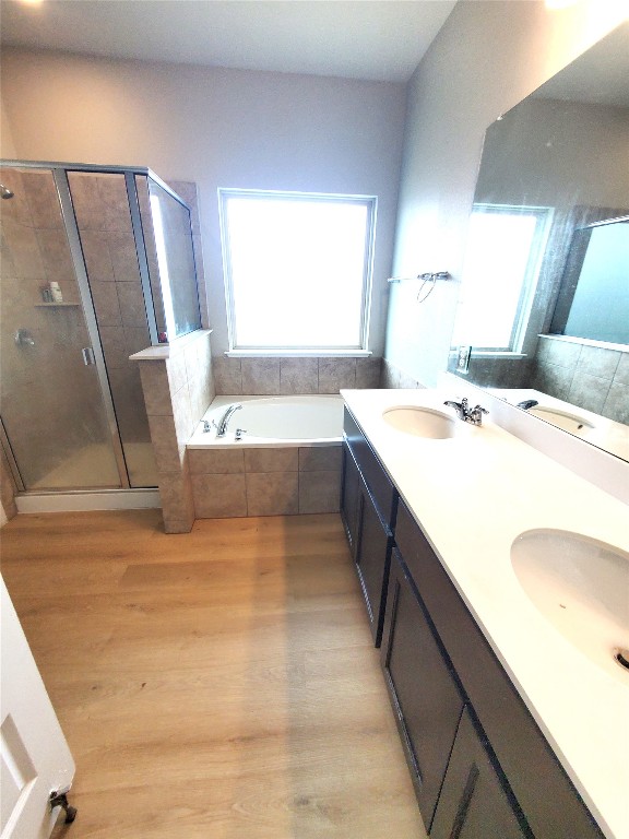 101 Prosecco Path Leander, TX 78641 - Photo 15 of 21 a spacious bathroom with a tub sink and mirror