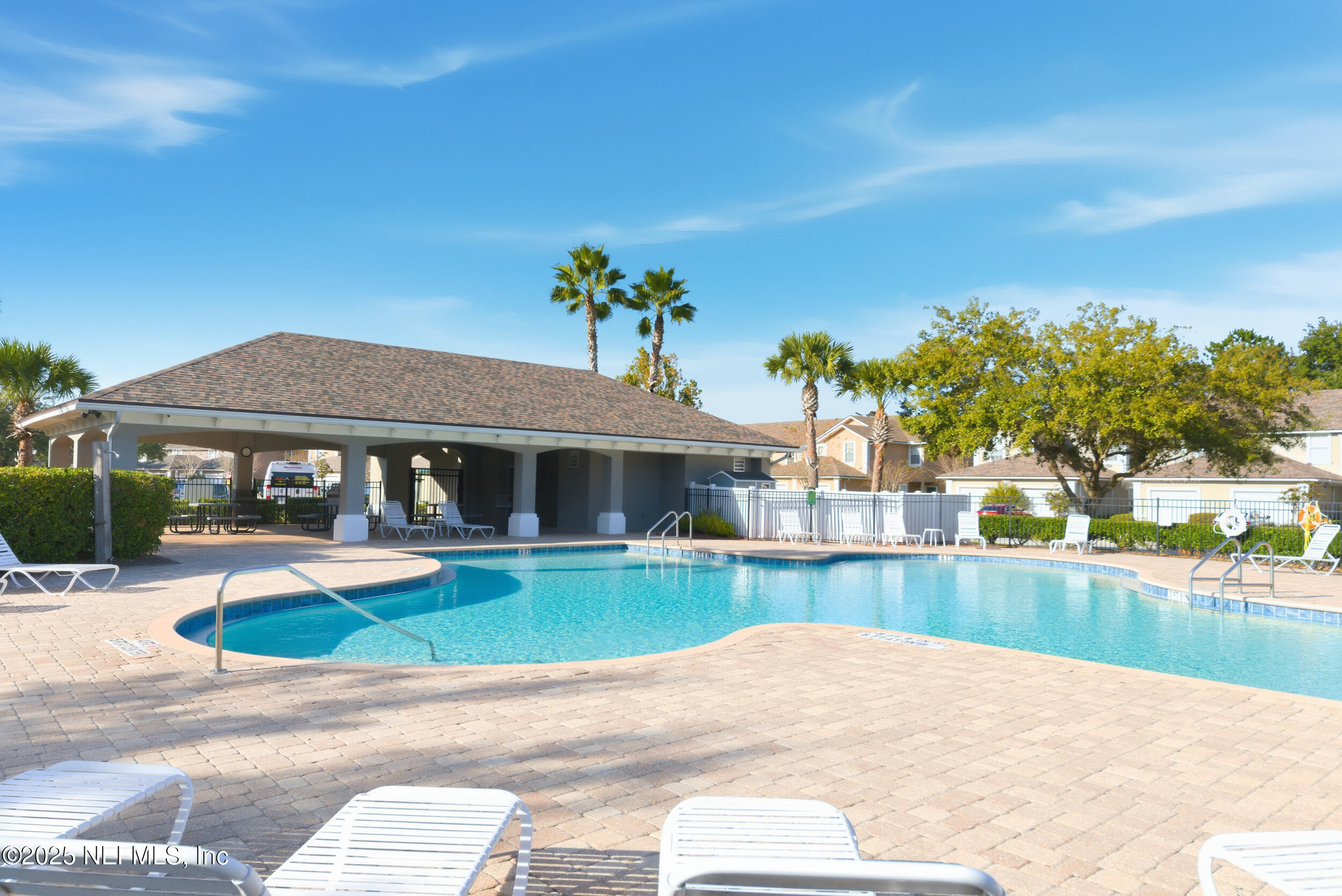 216 Scrub Jay Drive St. Augustine, FL 32092 - Photo 26 of 27 a house view with a garden space