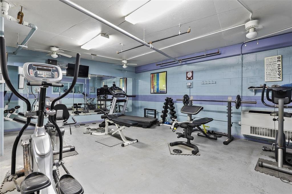 3102 Kings Road, Unit 2208 Dallas, TX 75219 - Photo 6 of 19 a view of a room with gym equipment